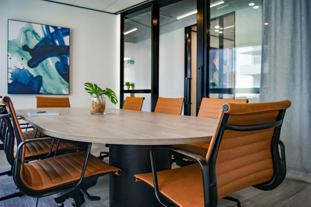 Open plan office workstation benches with chairs